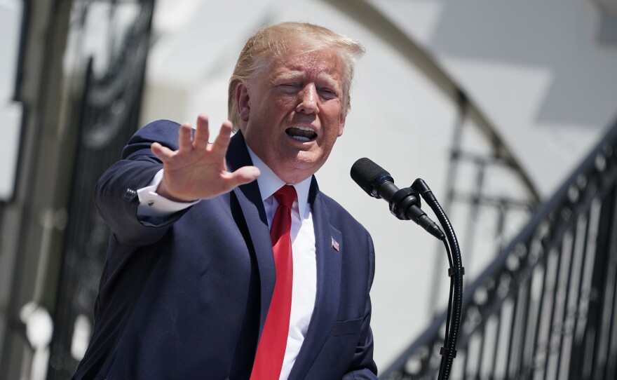 At a ceremony Monday at the White House, President Trump defended his racist tweets against Democratic lawmakers. The language used in that tweet has a long history connected with nativist political movements in the U.S.