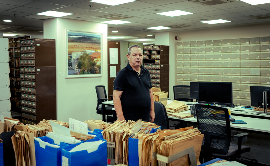 Amos Harel, military and defense analyst for the Israeli daily Haaretz, is pictured inside the newspaper's archival library in Tel Aviv. Harel has extensively reported on Israeli defense strategy, military operations, and Middle East security for decades.