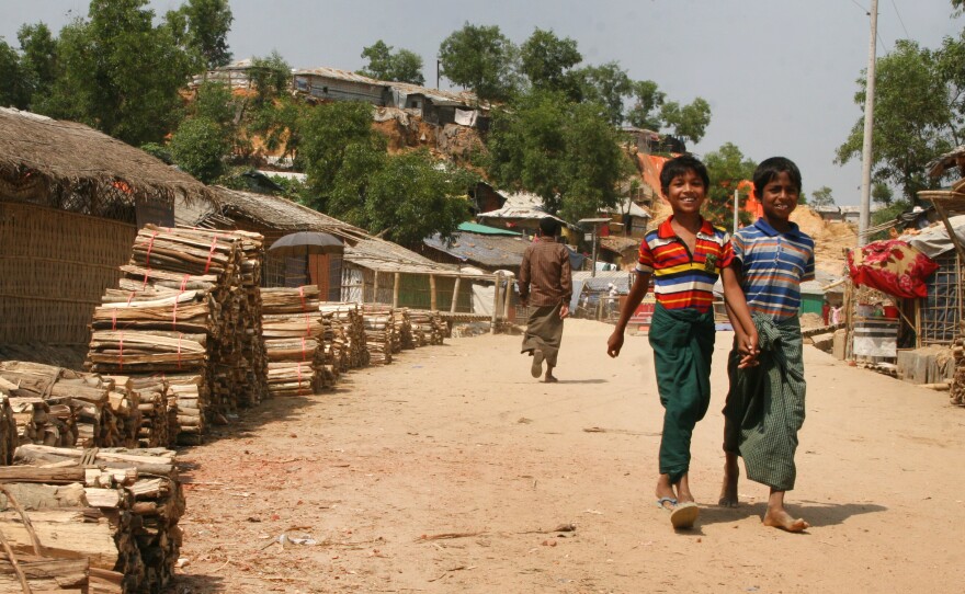 Firewood is stacked for sale in a Rohingya refugee camp in Bangladesh. Local residents complain that the Rohingya have cut down all the trees surrounding the camps and burned them in cooking fires.
