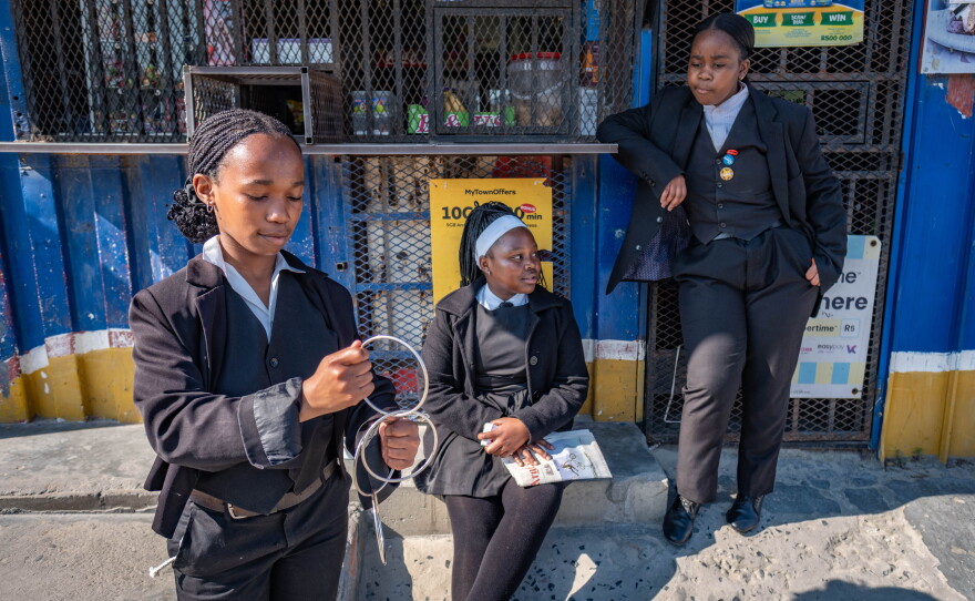 Students from the Cape Town College of Magic do their magic trick homework in the Mfuleni neighborhood where they live.