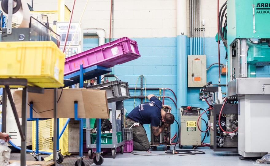 John Harris replaces power cables for a thermulator at Cooper Standard.