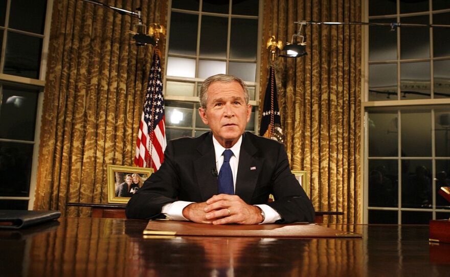 President  George W. Bush poses for photographers after addressing the nation on the military and political situation in Iraq from the White House on Sept. 13, 2007.