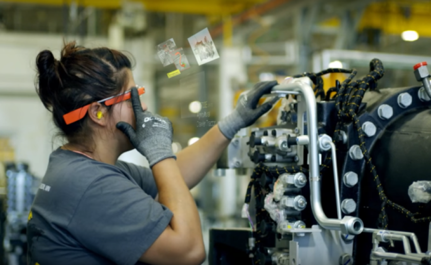 A factory worker in Jackson, Minn., uses Google Glass on the assembly line.