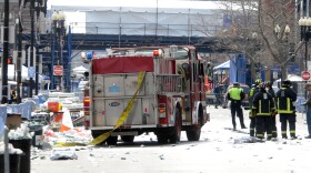 Firefighters take postion on Boyltson Street near the finish line after two bombs exploded during the 117th Boston Marathon on April 15, 2013 in Boston, Massachusetts. 