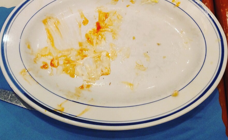 Caption from @emptyplatesofny: "Never meet your heroes. They always get eaten." — Julian, Fort Greene; Delicious Buffalo chicken meatball hero with French fries