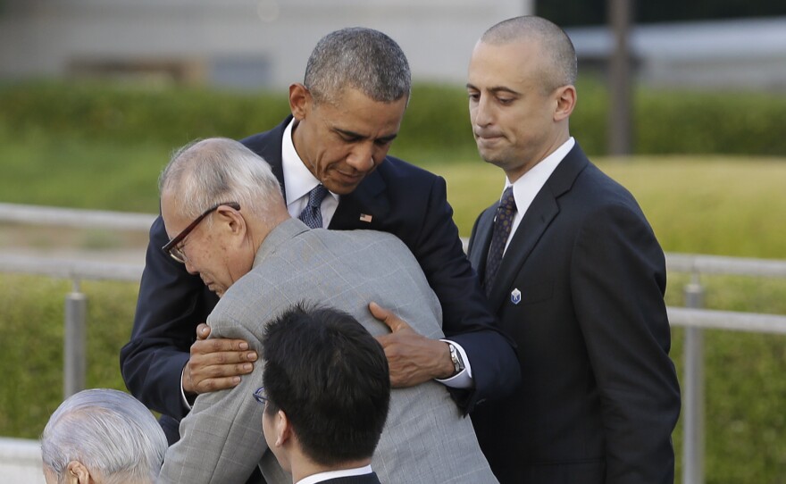 President Obama hugs Shigeaki Mori, an atomic bomb survivor and a creator of the memorial for American WWII POWs killed in Hiroshima, during a ceremony at Hiroshima Peace Memorial Park in Hiroshima on Friday. Obama became the first sitting U.S. president to visit the site of the world's first atomic bomb attack.