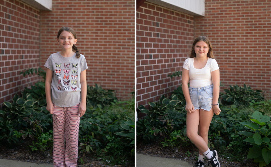 Fifth-grader Teagan Donovan, at left, doesn't go for ketchup, mustard or mayo on her catfish sandwich. Classmate Raelynn Truitt is also a fan: "It kind of tastes like crabs, but in a fish way," she says.