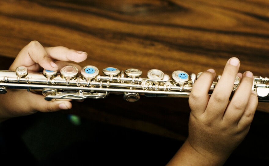 Ellingson, the flute instructor, is a big believer in the power of stickers to help her students remember where to place their fingers.