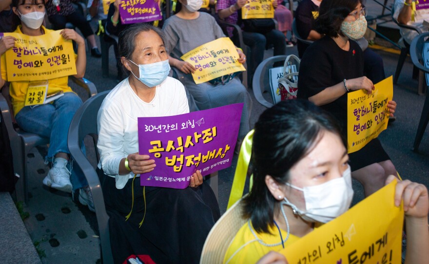 Hundreds of people gather for a rally to mark the International Memorial Day for Comfort Women on August 14, 2020 in Seoul, South Korea. A South Korean court recently ordered Japan to financially compensate 12 women forced into sexual slavery by the Japanese.