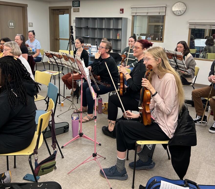 The string section of the Coronado Terrible Orchestra listens to instruction from conductor Cassie O'Hanlon during a rehearsal on Feb. 4, 2026.