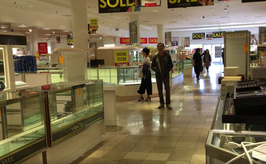 Display cases are mostly empty as shoppers look for bargains at Macy's closeout sale, March 9, 2017.
