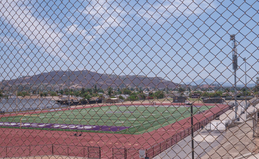 Santana High School's football field, on the east side of campus, is shown through a chain link fence on Aug. 12, 2026.