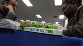 Job seekers have their resumes reviewed during a 'Boot Camp' for job seekers at the San Mateo County Expo Center January 28, 2010 in San Mateo, California.