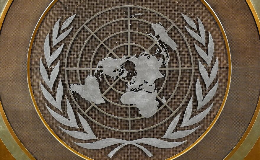 FILE - The United Nations logo is seen inside the 79th session of the United Nations General Assembly, Tuesday, Sept. 24, 2024.