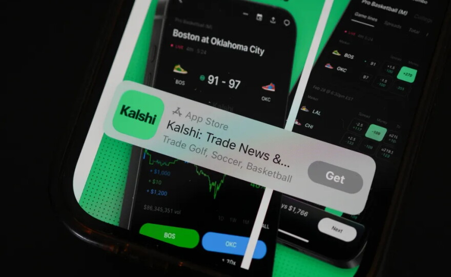 An ad for the prediction market app Kalshi is displayed on a mobile phone Thursday, April 16, 2026.
