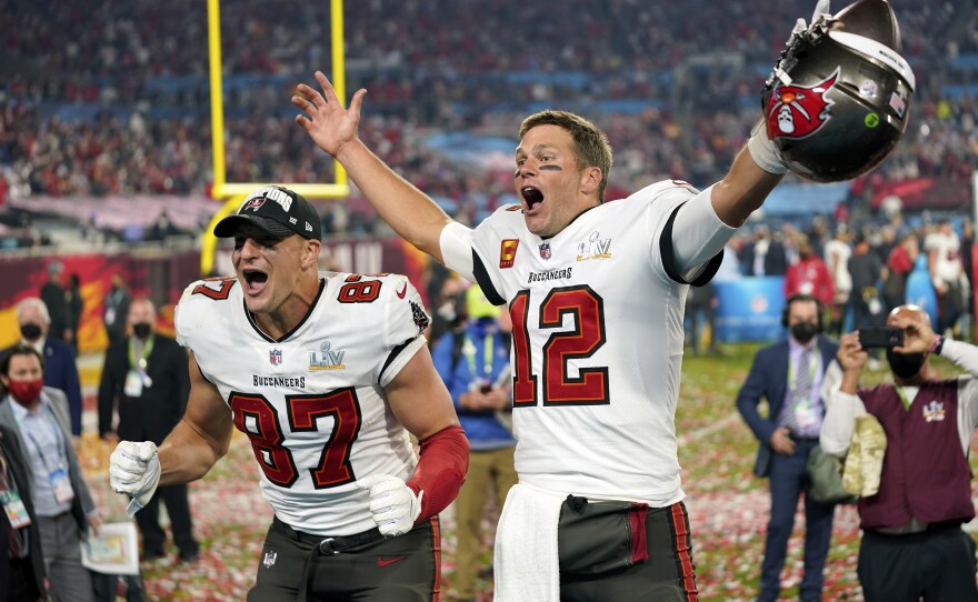 Tampa Bay Buccaneers tight end Rob Gronkowski, left, and quarterback Tom Brady celebrate after the NFL Super Bowl 55 football game against the Kansas City Chiefs in Tampa, Fla., in 2021.