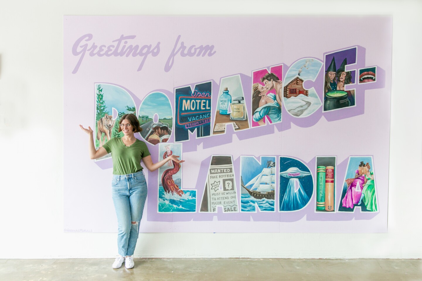 Meet Cute owner stands in front of a mural featured at the bookstore in this undated photo.