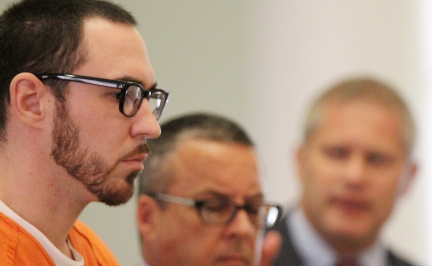 Joshua Vallum (left) is sworn in before entering a guilty plea on state charges at George County Circuit Court in Lucedale, Miss., last July. On Monday, he was sentenced to 49 years in prison for a federal hate crime — the first such case prosecuted for a crime specifically targeting a victim due to gender identity.