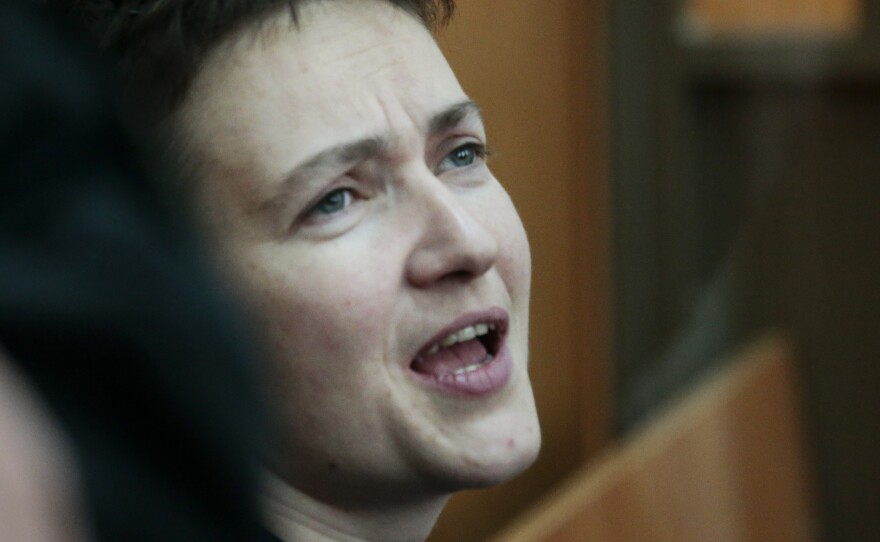 Ukrainian pilot Nadezhda Savchenko speaks in court, where she was sentenced to 22 years in prison for the deaths of two Russian journalists. She says there is proof she had already been taken prisoner before they died.