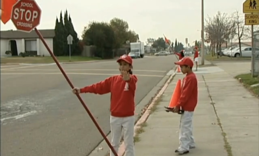 Members of the School Safety Patrol are shown in an undated training video from the program.