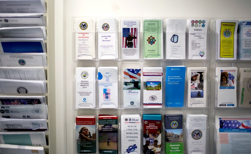 Pamphlets detailing services available to veterans are displayed in VSO Bob Kelley's office in Marion, Ind.