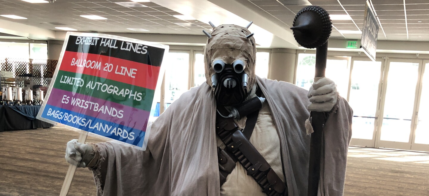 A Tusken Raider guides people to the right place at Comic-Con. July 25, 2024