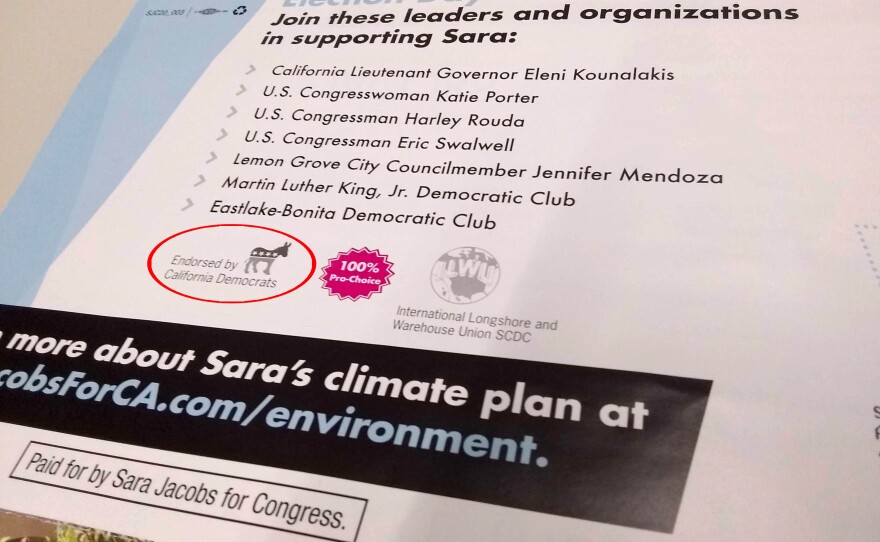 Sara Jacobs mailer with the language that the local Democratic Party chair says is misleading in this Feb. 11, 2020 photo.