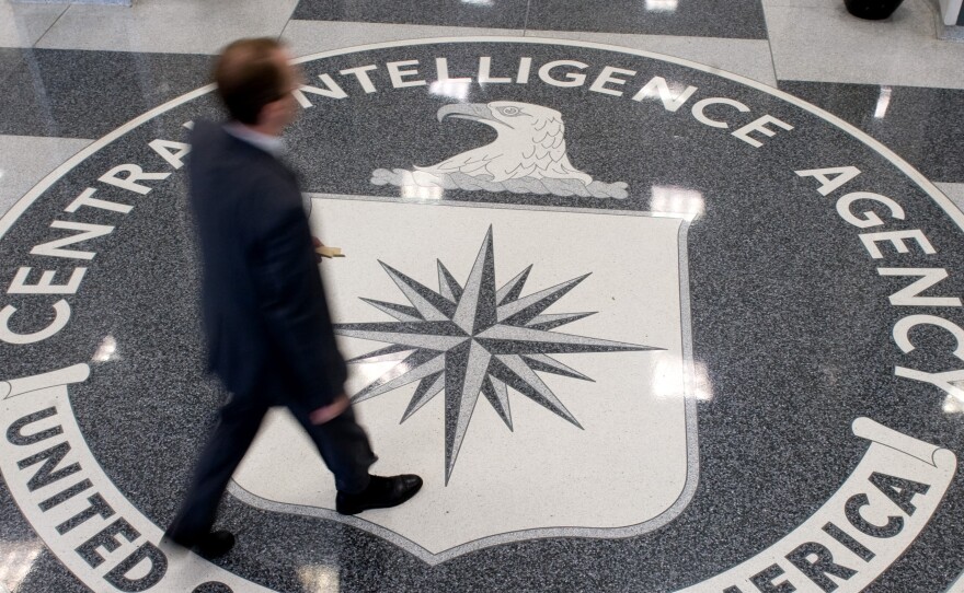 Armed with Internet connections and Google, a team of ordinary people are making better predictions than CIA analysts. A man crosses the Central Intelligence Agency logo in the lobby of CIA Headquarters in Langley, Va., on Aug. 14, 2008.