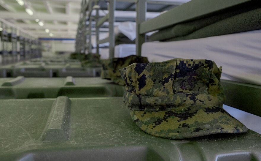Marine Corps recruits' patrol hats on footlockers inside a barrack at Camp Pendleton, April 7, 2021.