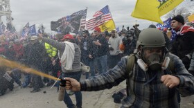 Trump supporters clash with police and security forces as rioters try to storm the U.S. Capitol on Jan. 6, 2021.