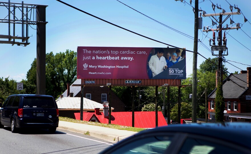 A Mary Washington Hospital billboard greets people coming into town.