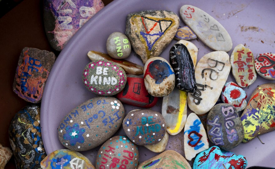 "Blessing rocks" with handwritten messages are free for the taking outside the Arivaca Community Center.