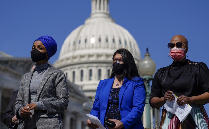Reps. Ilhan Omar, Rashida Tlaib, and Ayanna Pressley, seen here at a news conference outside the U.S. Capitol on March 11, are calling on the Biden administration to lift the cap on refugees.