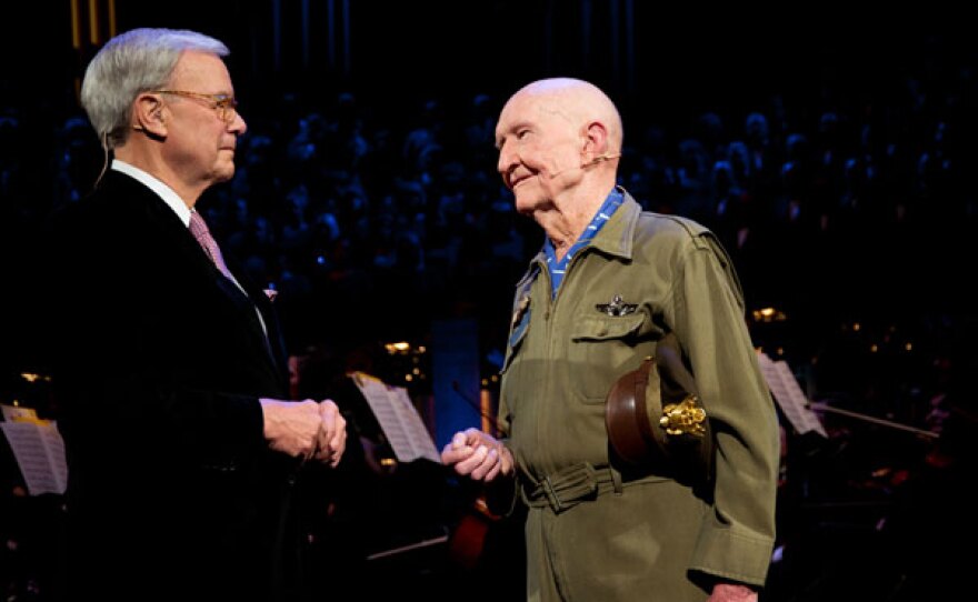 Veteran newscaster Tom Brokaw greets Gail “Hal” Halvorsen, the American “candy bomber” who dropped gum and chocolate for German children during the Berlin airlift of 1948-49.