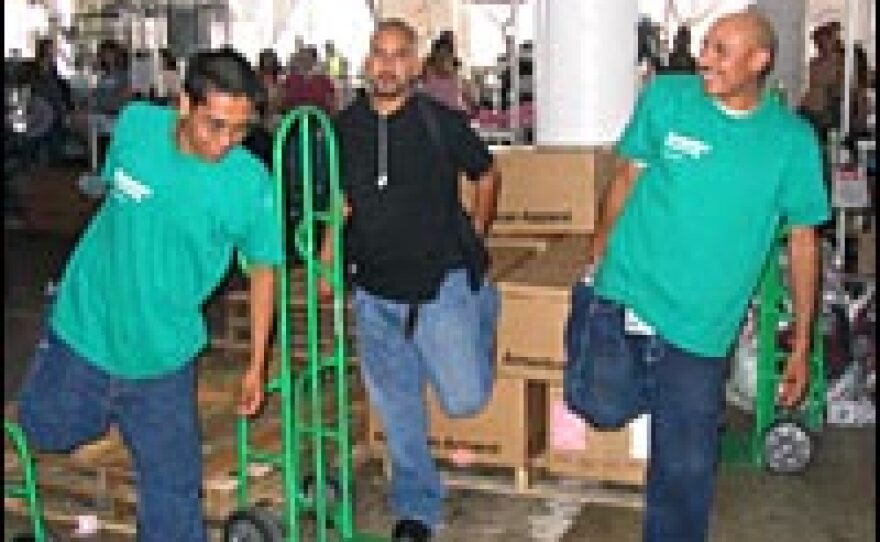 Every afternoon, American Apparel workers stop to stretch -- there's also roving massagers.