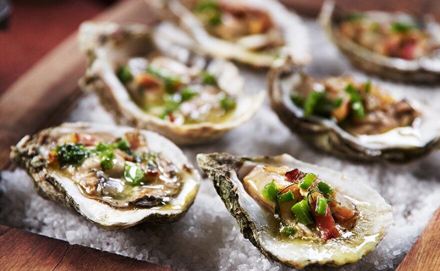 Pictured: smoke-roasted Florida oysters and clams, invigorated by the sweet scent of wood smoke. Steinhatchee, Fla., population 1500, perches on the north shore of the historic Steinhatchee River where it joins the Gulf of Mexico. The episode “Gulf Coast Grill” explores the spirited seafood-rich grilling of this Gulf Coast town.