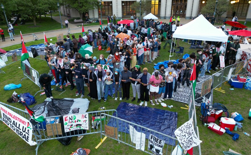 Case Western Reserve University students link arms on campus on April 30, in Cleveland.