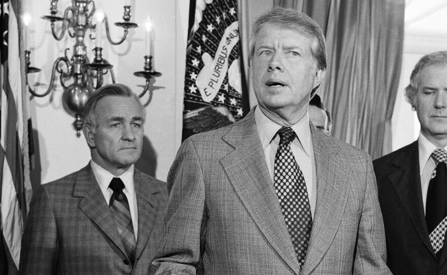 President Jimmy Carter spells out his plan for reorganization of the U.S. intelligence community in 1978. CIA Director Stansfield Turner (left) later fired hundreds of CIA employees in what was dubbed the "Halloween Massacre" of 1979.