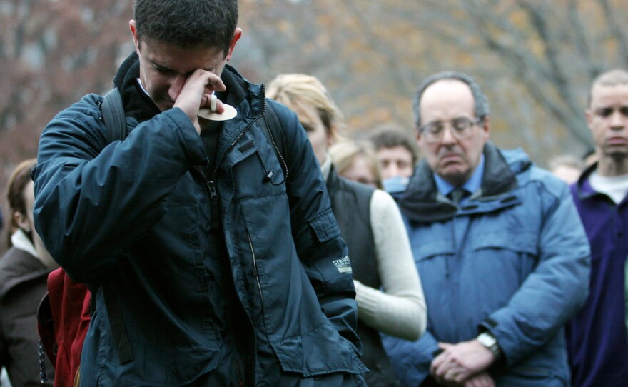 Student Kahlil Quato fights tears as he speaks at a University of Chicago candlelight vigil in 2007. The service was held in remembrance of Amadou Cisse, a graduate student, who was shot to death at point-blank range.