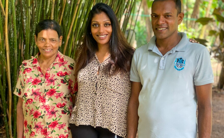 Linn Sjöbäck (center) is an adoptee who was born in Sri Lanka and lives in Sweden. She recently was reunited with her brother and mother following a video call in 2022.