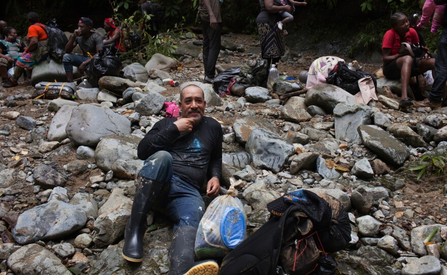 Vivó takes a break on a riverbank while trekking through the Darién jungle. "I don't like to admit it, but I feel very bad, very tired," he declared at one point.