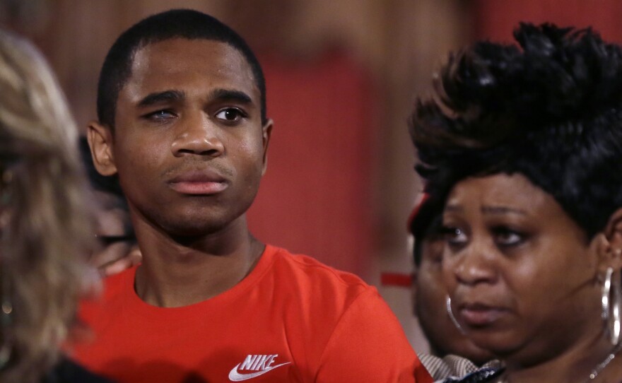 Davontae Sanford stands with his mother, Taminko Sanford, following his release after nine years in prison for murders he did not commit. He was one of 52 people exonerated for murder in 2016, according to a new report.