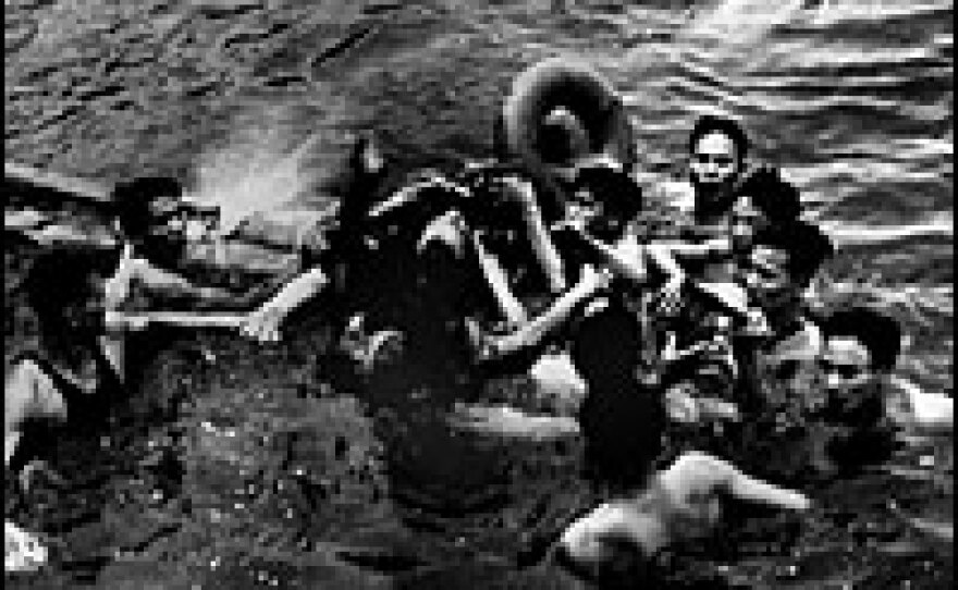 An Oct. 26, 1967, photo of John McCain being pulled from Truc Bach Lake in Vietnam after his Navy warplane was shot down.