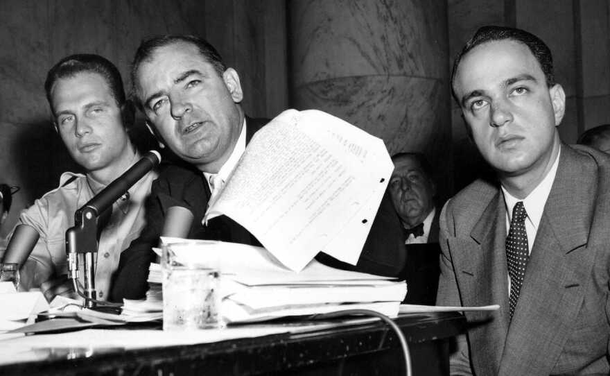 Sen. Joe McCarthy is seen during the Army-McCarthy hearings, June 7, 1954 in Washington, D.C. On the right is McCarthy's chief counsel, Roy Cohn.