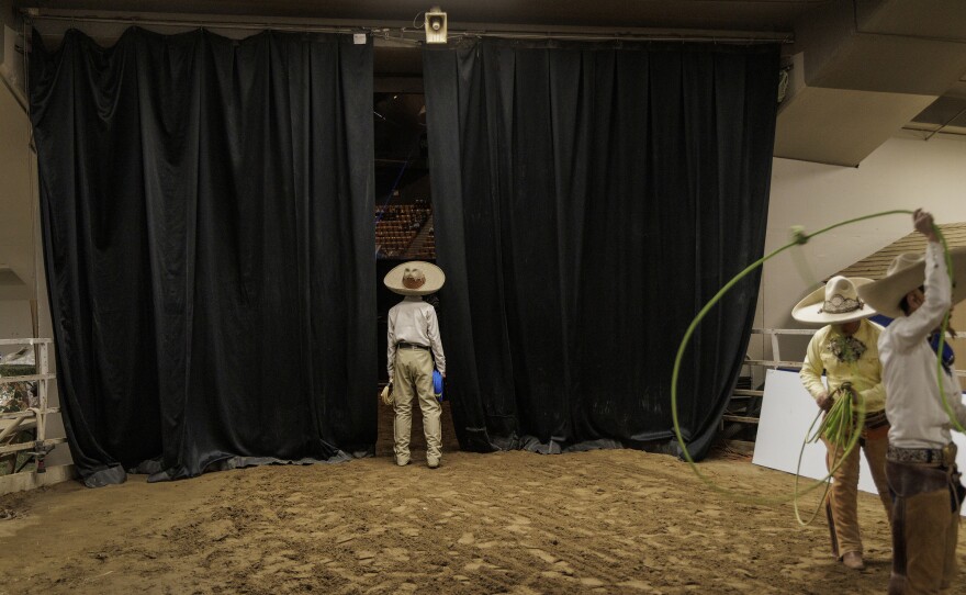 Young ropers wait backstage before their performance at the Mexican Rodeo Extravaganza.