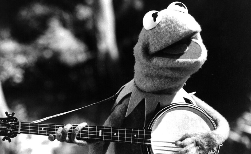 Kermit the Frog plays his banjo in 1979's The Muppet Movie.