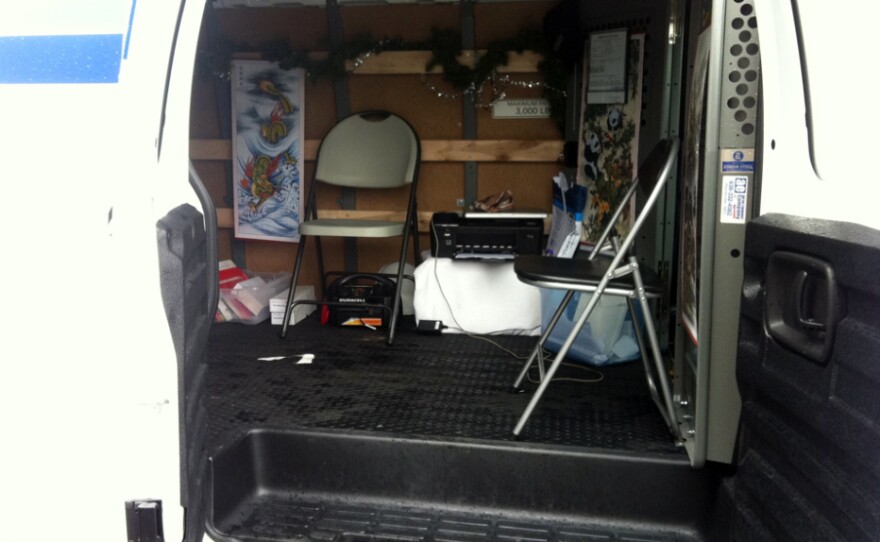 The Lucky Dragon van. The business helps frustrated visa applicants outside the Chinese consulate office in New York City.