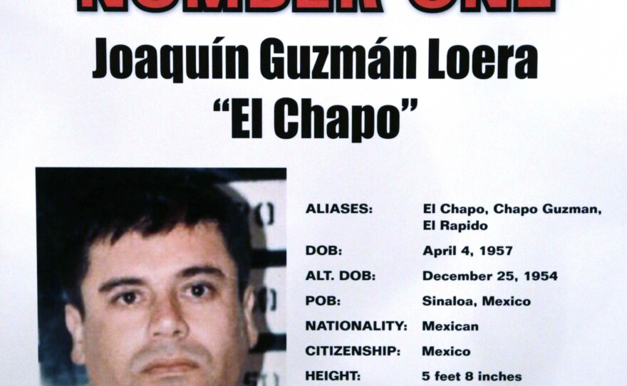 This Feb. 14, 2013 file photo shows a poster displayed at a Chicago Crime Commission news conference in Chicago, where Joaquin "El Chapo" Guzman, a drug kingpin in Mexico, was named as Chicago's Public Enemy No. 1.