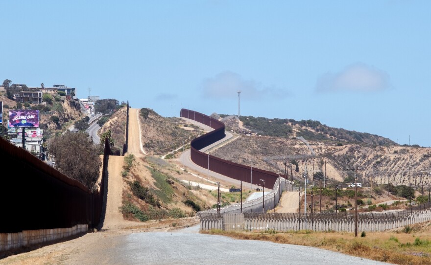 International Hill with Tijuana on the left and the American border walls on the right looking west from the American side June 14, 2022.