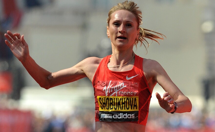 Bribes paid by runner Liliya Shobukhova are at the center of an ethics inquiry, according to the IAAF, track and field's governing body.